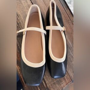 Amazon Black and Cream Flats